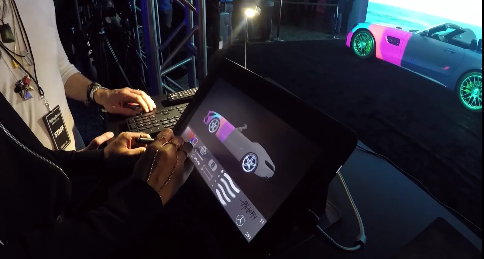 Interactive vehicle experience controlled through a tablet inside a live technology environment