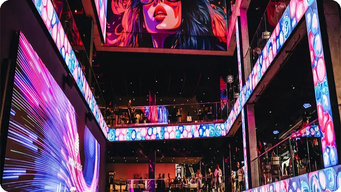Immersive event environment wrapped in large-format digital displays
