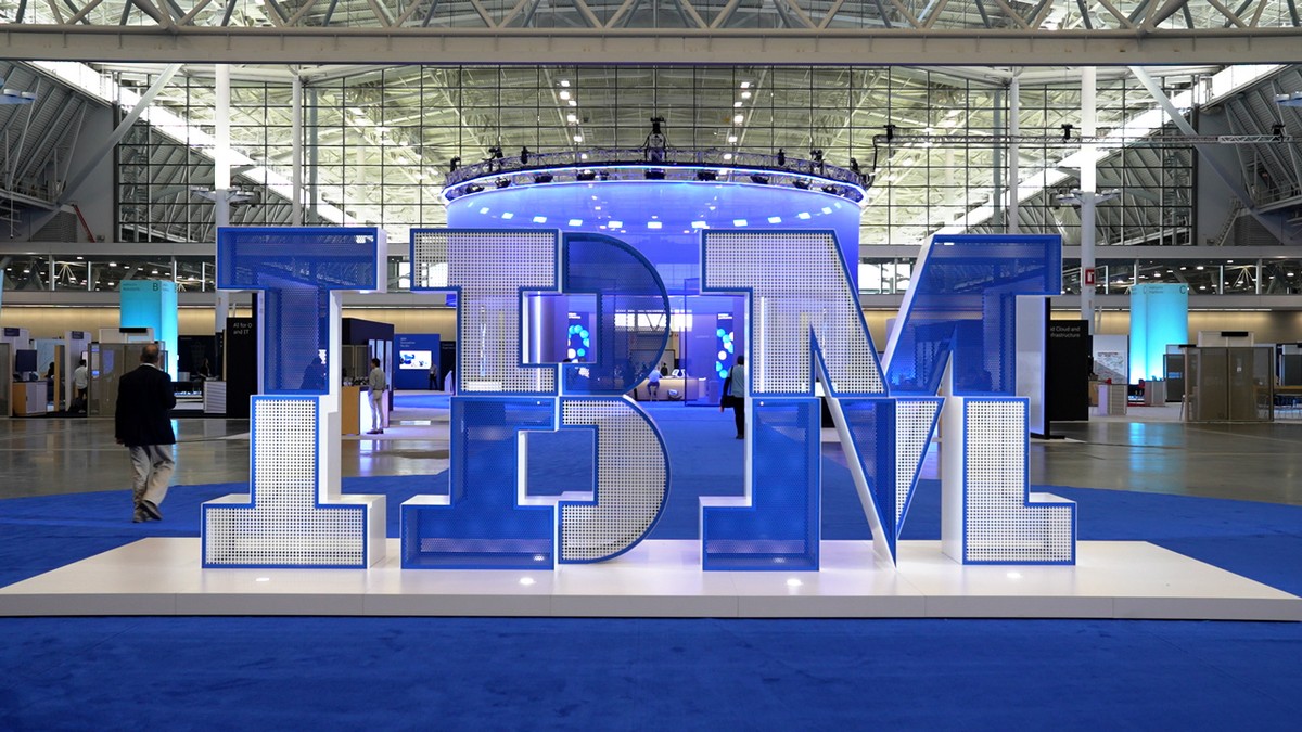 Fabricated conference environment with integrated screens and illuminated architectural letterforms