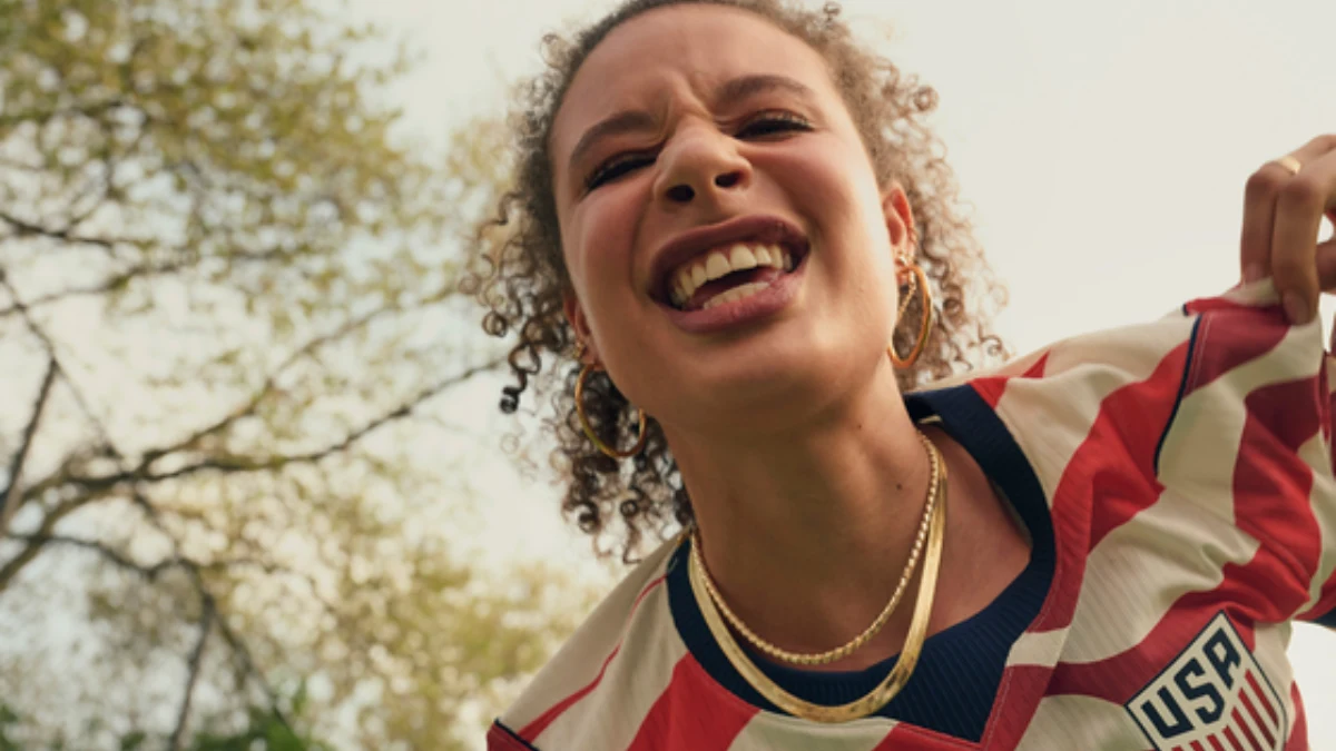 Lifestyle campaign portrait of a person outdoors wearing colorful clothing