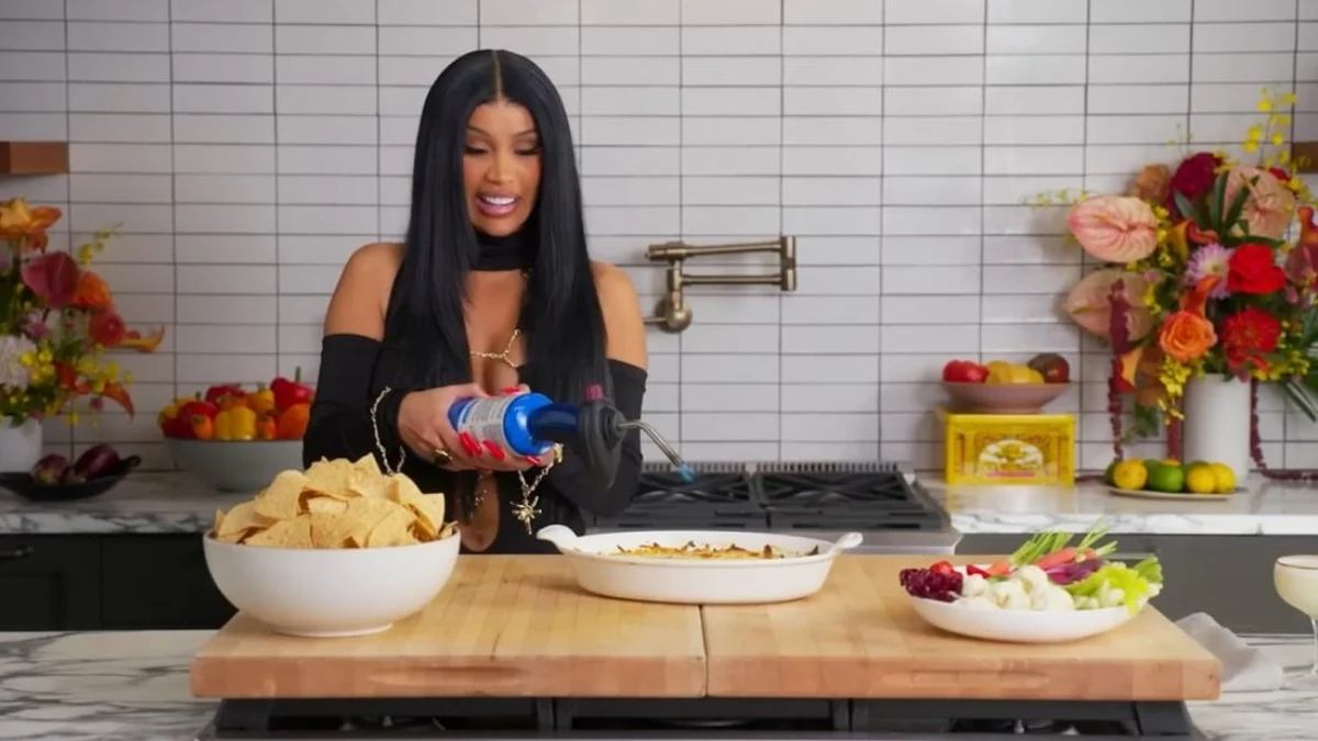 Presenter preparing food in a studio kitchen